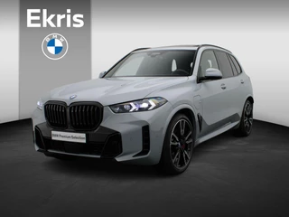 BMW X5 xDrive50e M Sportpakket Pro | Travel Pack | Innovation Pack | Comfort Plus Pack | Exclusive Pack | Integral Active Steering | Adaptief onderstel met luchtvering op voor- en achteras | Trekhaak | Glazen panoramadak Sky Lounge | M Multifunctionele voorstoelen | Driving Assistant Professional | Parking Assistant Professional | Harman Kardon | 22''