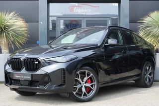 Hoofdafbeelding BMW X6 BMW X6 M60i xDrive 531pk Panoramadak/360camera/HK/HUD