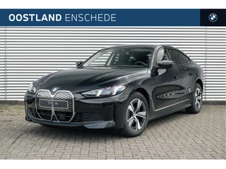 Hoofdafbeelding BMW i4 BMW i4 eDrive40 Gran Coupe Pure Edition / Achteruitrijcamera / Adaptieve LED / Active Cruise Control / Live Cockpit Plus / Stuurverwarming