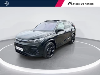 Volkswagen Tiguan 1.5eHybrid 150kW/204PK R-Line Black Style DSG · Panoramadak · Harman Kardon ·  Trekhaak · 360°Camera + Parkeersensoren · Dodehoeksensor ·  Garantie t/m 02-06-30 of 100000km.