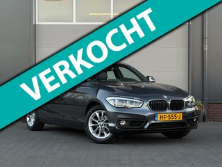 BMW 1-serie 118i/136pk Essential|2015|Automaat|NAP|H&K|Leder|Clima|Zwarte hemel|16" LMV