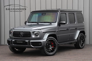Hoofdafbeelding Mercedes-Benz G-Klasse Mercedes-Benz G-Klasse 63 AMG | 585PK | Massage | PPF | Akrapovic | Burmester | Entertainment | Leder exclusief | Sfeerverlichting | Stoelkoeling | 2022.