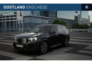 Hoofdafbeelding BMW iX1 BMW iX1 eDrive20 M Sport / Panoramadak / Trekhaak / Sportstoelen / M Adaptief onderstel / Comfort Access / Stoelverwarming / Adaptieve LED / Parking Assistant Plus / Head-Up / Harman Kardon