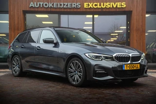 Hoofdafbeelding BMW 3 Serie BMW 3-serie Touring 330e High Executive M Sport Panodak Harman Kardon HUD Leer Alcantara