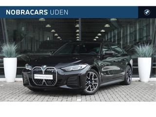 BMW i4 eDrive40 High Executive M Sport / Achteruitrijcamera / Stoelverwarming / Cruise Control / Airconditioning / PDC / Live Cockpit Professional