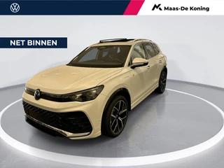 Hoofdafbeelding Volkswagen Tiguan Volkswagen Tiguan 1.5 204pk DSG eHybrid R-Line Edition · Panoramadak · Camera · Elek. Trekhaak · Keyless · Massage · 20'' Inch · Garantie t/m 24-03-2030 of 100.000km