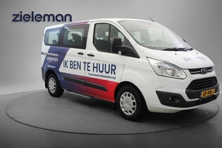 Hoofdafbeelding Ford Tourneo Custom Ford Tourneo Custom 2.2 TDCI L1H1 9 Persoons - Navi, Cruise, Trekhaak incl. BTW