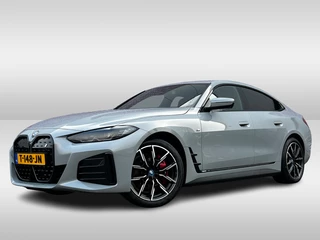 BMW i4 eDrive40 High Executive 84 kWh / Trekhaak / 360Camera / Head-up / Leder / 19'' / Navigatie / Stoelverwarming / DAB / Cruise Control