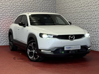 Hoofdafbeelding Mazda MX-30 Mazda MX-30 E-SKYACTIV R-EV PHEV BOSE 170PK ELEK.STOEL H.U.D CAMERA LED PLUG IN HYBRID  phev plugin