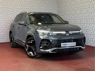 Volkswagen Tiguan 1.5 TSI R-LINE 3D LED GRILL 19''LMV ERGO.STOEL MASSAGE DESIGN PACK STOEL/STUUR VERW TREKHAAK 09/2024 "Volkswagen rijden begint bij Topautos.nl – 75 topmodellen direct op voorraad!"