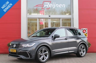 Volkswagen Tiguan 1.5 TSI 150PK R-Line Business+ | LED MATRIX KOPLAMPEN (IQ LIGHT) | NAVIGATIE | R-LINE INTERIEUR/EXTERIEUR | VERWARMBARE VOORSTOELEN | BEKLEDING LEDER VIENNA | AKOESTISCH GLAS GETINT | KEYLESS ACCESS/START | ELEKTRISCH BEDIENABRE ACHTERKLEP | DAKSPOILER R-LINE | APPLE CARPLAY/ANDROID AUTO | DAB+ RADIO | DRAADLOZE TELEFOONLADER | DIGITAAL DASHBOARD | CLIMA CONTROL VOOR EN ACHTERIN |