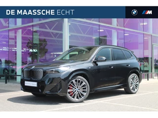 Hoofdafbeelding BMW iX1 BMW iX1 eDrive20 High Executive M Sport Automaat / Panoramadak / Trekhaak / Sportstoelen / Comfort Access / Stoelverwarming / Adaptieve LED / Parking Assistant Plus / Head-Up / Harman Kardon