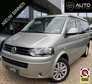 Volkswagen California T5 | 180PK | UNIEK | 1e EIGENAAR | DEALERONDERHOUDEN | NL AUTO | AUTOMAAT | ELEK HEFDAK | Bearlock | Nette Staat | Parkeersensoren Voor en Achter | Standkachel | Stoelverwarming |