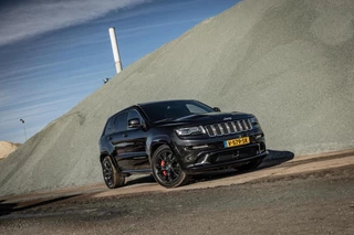 Hoofdafbeelding Jeep Grand Cherokee Jeep Grand Cherokee 6.4 V8 SRT Grijs Kenteken - LPG/G3 - Pano - Leder - Xenon