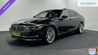 Hoofdafbeelding BMW 7 Serie BMW 7-serie 740e iPerformance High Executive|Schuif/Kanteldak|360 Camera|H&K|Stuurverwarming|Stoelverwarming Voor&Achter|Zwarte Hemel|