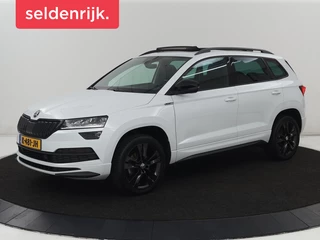 Hoofdafbeelding Škoda Karoq Skoda Karoq 1.5 TSI Sportline | Panoramadak |  Stoelverwarming | Adaptive cruise | Camera | Sportstoelen | Virtual Cockpit | Navigatie | Sfeerverlichting | Full LED | 18'' | Keyless | Climate control