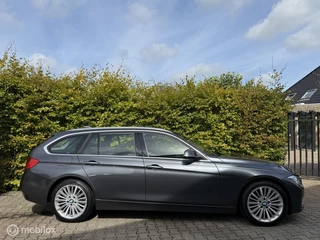 BMW 3-serie Touring 320i High Executive Xenon/Leder/Dealer ondehouden