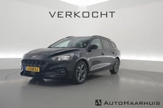 Hoofdafbeelding Ford Focus Ford Focus Wagon 1.0 EcoBoost ST Line | Navi | CarPlay | Stoel-stuurverw. | Camera | 17''