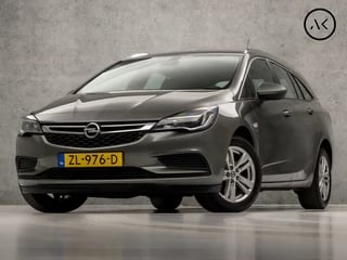 Opel Astra Sports Tourer 1.4 Turbo 120 Jaar Edition 150Pk (APPLE CARPLAY, NAVIGATIE, TREKHAAK, LM VELGEN, SPORTSTOELEN, BLUETOOTH, ELEK PAKKET, NIEUWE APK, NIEUWSTAAT)