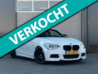 Hoofdafbeelding BMW 1 Serie BMW 1-serie M135i/320pk xDrive High Executive|2014|Miltek|OZ.Racing|Harman/Kardon|Leder|Navi|Cruise|19"LMV