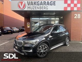 Hoofdafbeelding BMW X1 BMW X1 xDrive25e High Executive X-Line // FULL LED // KEYLESS // ELEK. ACHTERKLEP // HALF LEDER // NAVI+APPLE CARPLAY // STOELVERWARMING //