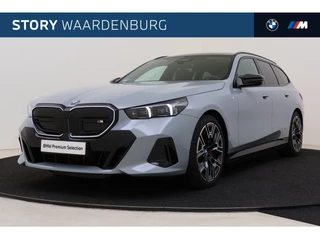 BMW i5 Touring M60 xDrive / Panoramadak / Trekhaak / Bowers & Wilkins / Adaptief onderstel professional / Parking Assistant Professional / Stuurverwarming