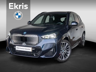 BMW iX1 eDrive20 | M Sportpakket Pro | Travel Pack | Comfort Access | Harman-Kardon | Achteruitrijcamera | Panoramadak | Stoelverwarming | 20''