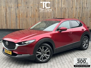 Mazda CX-30 2.0 e-SkyActiv-X M Hybrid Luxury Automaat | Open dak | Bordeauxrode lak | Stoel en- Stuurwielverwarming | Rondomzicht camera | Afneembare trekhaak | Lederen bekleding | Bose audio | Parkeersensoren voor en achter