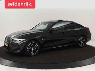 BMW 3-serie 320e M Sport | Schuifdak | Trekhaak |  Leder/Alcantara | Camera | Stoel & stuurverwarming | Carplay | Sfeerverlichting | Sportstoelen | Adaptief LED | Navigatie | Park Assist | Widescreen Display | PHEV | Plug In