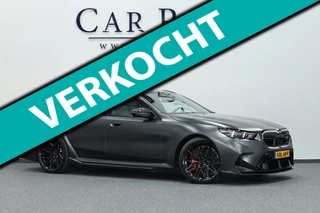 Hoofdafbeelding BMW M5 BMW 5-serie Touring M5 1000+PK BTW/AKRAPOVIC OPF DELETED/KERAMISCH/CARBON M-PERFORMANCE/EVENTURI/22” VOSSEN/B&W/PANO/HUD/GARANTIE!