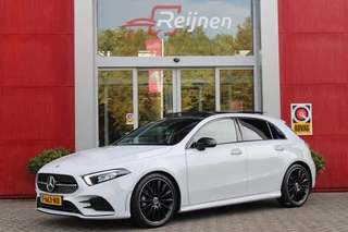 Mercedes-Benz A-klasse 180 136PK AUTOMAAT AMG LINE | STERRENHEMEL! | PANORAMISCH SCHUIF/KANTEL DAK | SFEER VERLICHTING | NAVIGATIE | ACHTERUITRIJ CAMERA | PARKEERSENSOREN VOOR EN ACHTER | HIGH PERFORMANCE LED KOPLAMPEN | STOEL VERWARMING | KEYLESS - GO | SPIEGEL PAKKET | NIGHT PAKKET | LICHTMETALEN VELGEN 19" | EERSTE EIGENAAR! |