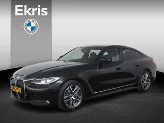 BMW i4 eDrive40 84 kWh Trekhaak Elektrisch | Camera | Parkeersensoren voor en achter | Stoelverwarming | Harman Kardon | M Hemelbekleding Anthrazit