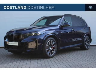 Hoofdafbeelding BMW X5 BMW X5 xDrive50e High Executive M Sport Automaat / Panoramadak / Trekhaak / Adaptief onderstel / Soft-Close / Parking Assistant Professional / Comfort Access / Adaptieve LED