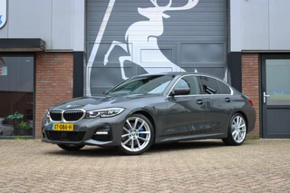 Hoofdafbeelding BMW 3 Serie BMW 3-serie 330i High Executive Edition M-sport / Dravit Grau / Head-up / 19'' Breyton / Elek. Trekhaak
