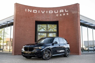 Hoofdafbeelding BMW X5 BMW X5 xDrive45e M-Sport 4-Wielsturing Laser HuD Pano 360