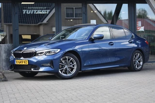 Hoofdafbeelding BMW 3 Serie BMW 3-serie 320i High Executive | HARMAN KARDON | SCHUIF KANTELDAK | LEDER | STOELVERWARMING | SFEERVERLICHTING | APPLE CARPLAY