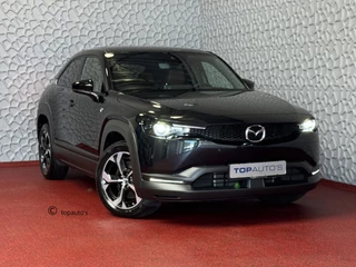 Hoofdafbeelding Mazda MX-30 Mazda MX-30 E-SKYACTIV R-EV PHEV 170 PK ELEK.STOEL H.U.D. CAMERA LED PLUG IN HYBRID phev plugin