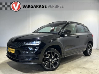 Škoda Karoq 1.5 TSI ACT Sportline Business | Navigatie/Android/Apple Carplay | LM Velgen 19" | Elektrisch Glazen Panoramadak | Voorstoelen Verwarmd | Achteruitrijcamera | Trekhaak Uitklapbaar | Cruise Control Adaptief |