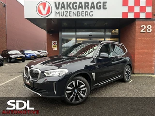 Hoofdafbeelding BMW iX3 BMW iX3 High Executive 80 kWh // LEDER // ELEK.STOEL + GEHEUGEN // SCHUIF-KANTELDAK // CAMERA+SENSOREN // ELEK. KLEP // CARPLAY + NAVI //