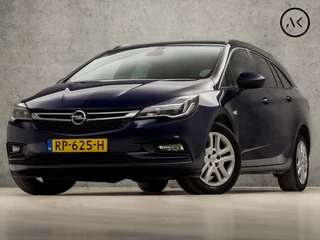 Hoofdafbeelding Opel Astra Opel Astra Sports Tourer 1.4 Business+ 150Pk (APPLE CARPLAY, GROOT NAVI, GETINT GLAS, CRUISE, SPORTSTOELEN, ARMSTEUN, TREKHAAK, NIEUWSTAAT)