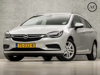 Opel Astra Sports Tourer 1.0 Sportline (APPLE CARPLAY, NAVIGATIE, STUUR/STOELVERWARMING, PARKEERSENSOREN, SPORTSTOELEN, TREKHAAK, ELEK PAKKET, NIEUWE APK, NIEUWSTAAT)