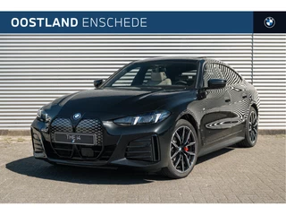 Hoofdafbeelding BMW i4 BMW i4 eDrive35 Gran Coupé M Sport / Schuif-kanteldak / Trekhaak / Parking Assistant Plus / Adaptieve LED / Live Cockpit Professional / Comfort Access