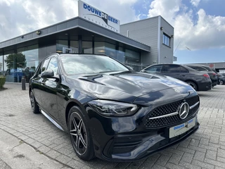 Hoofdafbeelding Mercedes-Benz C-Klasse Mercedes-Benz C-Klasse Estate 300 e AMG Line Pano-Dak | Massage | Leer | Stoel en Stuurverw.