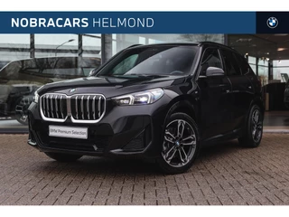 BMW X1 sDrive20i High Executive M Sport Automaat / Panoramadak / Trekhaak / Sportstoelen / M Adaptief onderstel / Comfort Access / Parking Assistant Plus / Head-Up / Harman-Kardon
