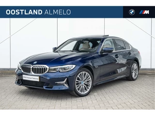 BMW 3 Serie 320e High Executive Luxury Line Automaat / Schuif-kanteldak / Sportstoelen / Laserlight / Achteruitrijcamera / Comfort Access / Head-Up / Live Cockpit Professional
