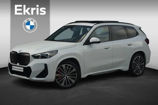 BMW iX1 eDrive20 M Sport Pro | Trekhaak / Head-up / Harman Kardon / Comfortstoelen Elektrische Stoelen met geheugen + Massagefunctie / Rondomzicht camera / Cruise control adaptief