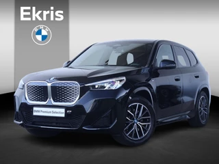 Hoofdafbeelding BMW iX1 BMW iX1 xDrive30 67 kWh / M-Sport Pakket / Achteruitrij Camera / PDC / Verwarmde Voorstoelen / 18'' LM / Getint Glas Achter /