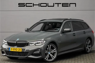 BMW 3 Serie Touring 320e M-Sport Dravitgrau Pano Leder Trekhaak 19"