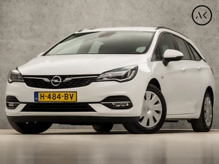 Opel Astra Sports Tourer 1.2 Deluxe (APPLE CARPLAY, NAVIGATIE, PARKEERSENSOREN, SPORTSTOELEN, CRUISE, NIEUWE APK, TREKHAAK, NIEUWE APK, NIEUWSTAAT)