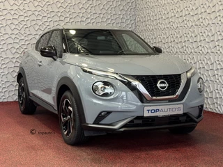 Hoofdafbeelding Nissan Juke Nissan Juke N-DESIGN NAVI AFN TREKHAAK STOEL.STUUR.VERW. LED CAMERA KEYLESS LMV 06/2024
